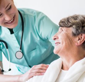 Doctor and older female patient